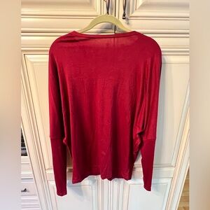 Bat wing blouse. Very roomy and oversized. It’s done in a  T-shirt type material